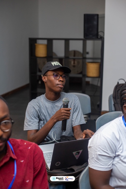 Aikins with asking questions at React Ghana Summit